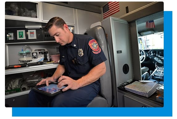 A police officer working on tablet